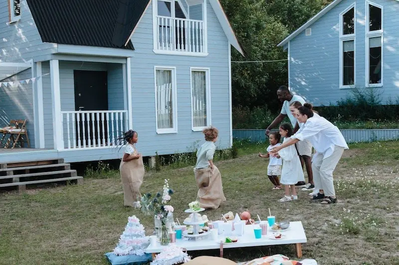 A family is enjoying outside the newly built granny flat