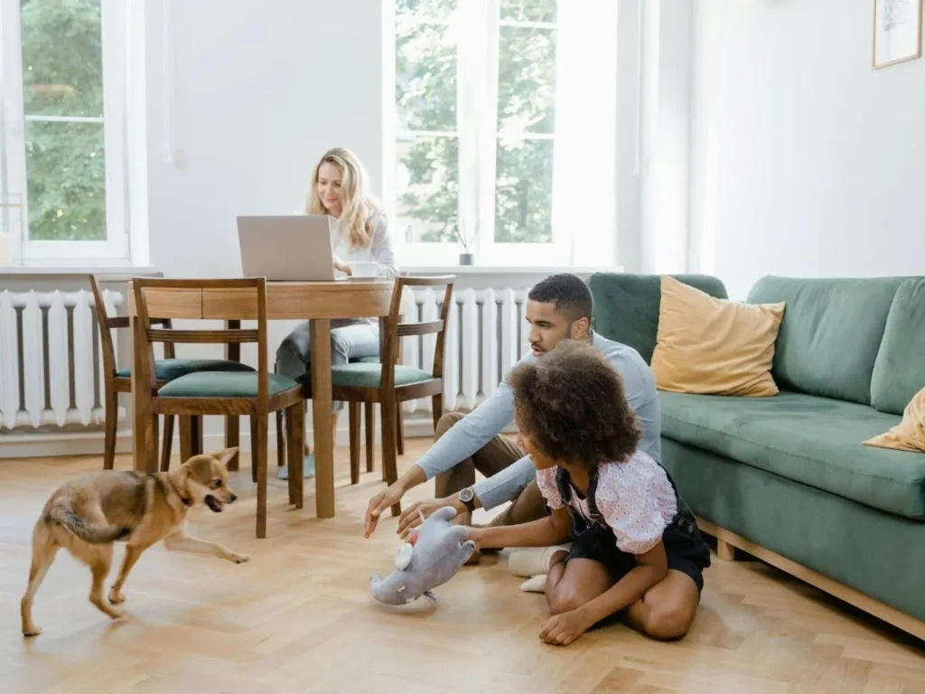 Open plan living area of a granny flat showing a family gathering