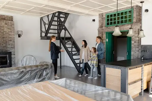 Landlord meeting potential tenants for granny flat rental screening Australia