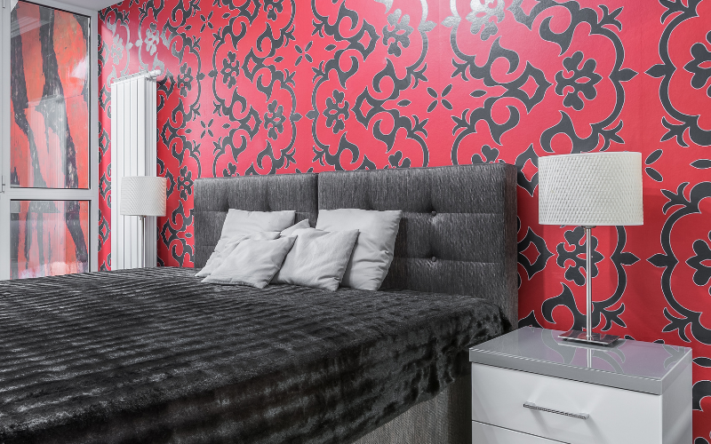 Bold geometric pattern wallpaper feature wall for granny flat bedroom accent wall idea